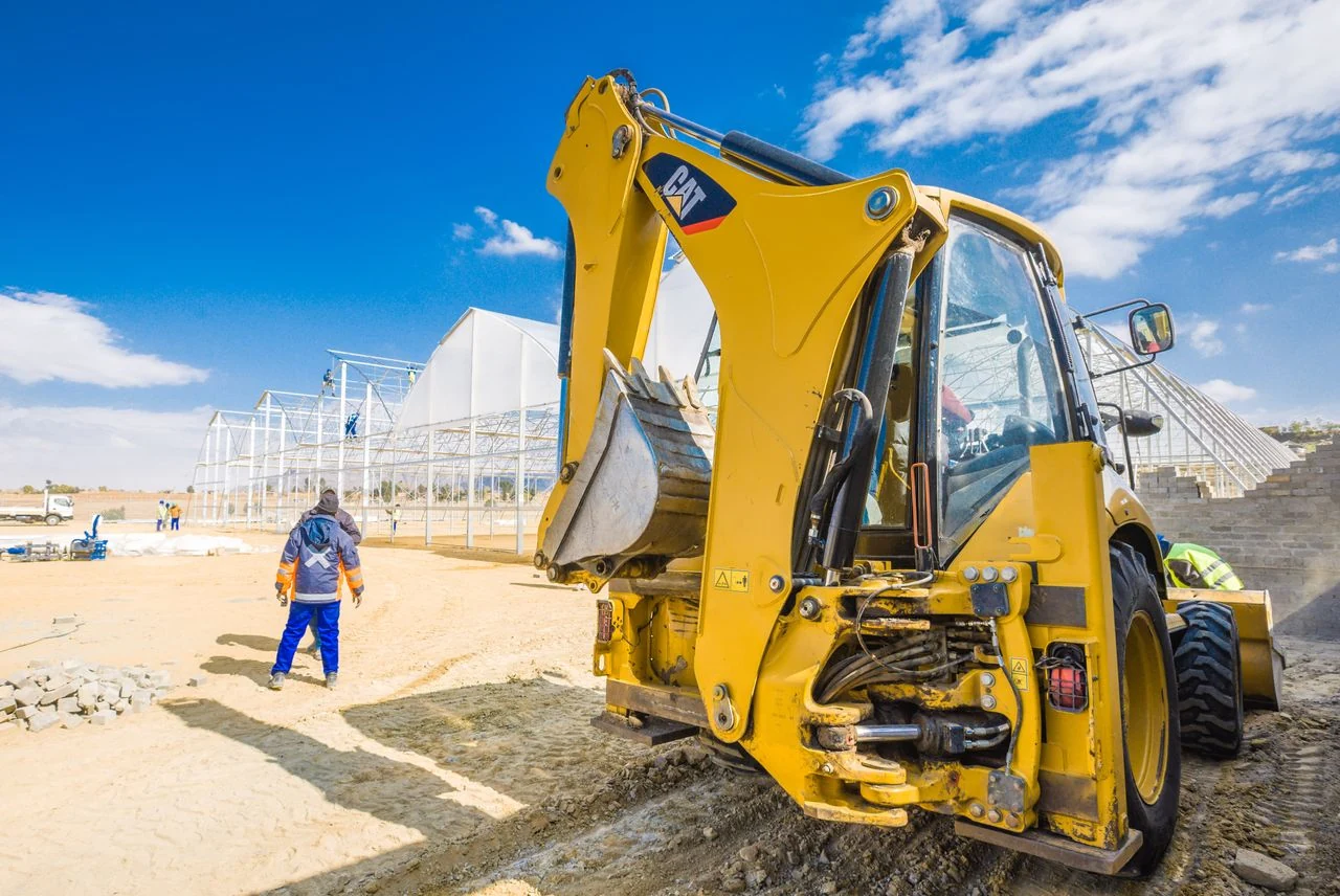Heavy equipment operating on a Jencons construction site